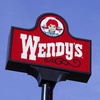 This Thursday, Feb. 25, 2021, photo shows a sign over a Wendy's restaurant in Des Moines, Iowa.