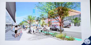 An artist rendering shows a pedestrian and bicycle-friendly environment during a Las Vegas Medical District Successes & Insights event at Las Vegas City Hall Tuesday, Aug. 23, 2022. The event was organized by the City of Las Vegas and the Downtown Vegas Alliance.