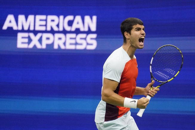 Carlos Alcaraz, of Spain, reacts after scoring a point against Frances Tiafoe, of the United States, during the semifinals of the U.S. Open tennis championships, Friday, Sept. 9, 2022, in New York. 

