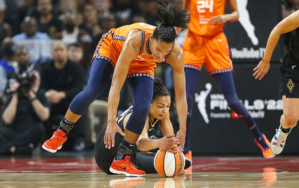 Las Vegas Aces center Kiah Stokes (41) fights for a loose ball with Connecticut Sun forward Alyssa Thomas (25) during the first half of Game Two of the 2022 WNBA Playoffs finals at the Michelob Ultra Arena at Mandalay Bay Tuesday, Sept. 13, 2022.