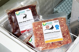 Venison dog food and pheasant cat food are displayed in a freezer during the grand opening of Fetching Foods, an ultra-premium pet food company, at 3111 S. Valley View Blvd., Thursday, Sept. 22, 2022.