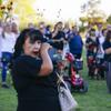 Angelica Cervantes, mother of Route 91 victim Erick Silva, cries while listening to a performance by Outlaws & Angels during the opening reception of the 5 Years Later: Remembering 1 October & Becoming Vegas Stronger exhibit at The Clark County Museum in Henderson, Friday, Sept. 23, 2022.