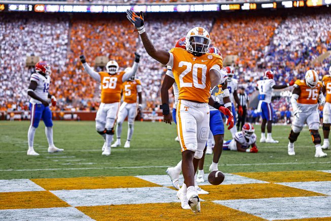 Tennessee running back Jaylen Wright (20) celebrates a touchdown during the second half of the team's NCAA college football game against Florida on Saturday, Sept. 24, 2022, in Knoxville, Tenn. Tennessee won 38-33. 


