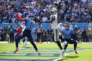 Tennessee Titans safety Kevin Byard (31) breaks up a pass intended for Las Vegas Raiders tight end Darren Waller (83) on a failed 2-point conversion late in the fourth quarter of an NFL football game Sunday, Sept. 25, 2022, in Nashville, Tenn. The Titans won 24-22.
