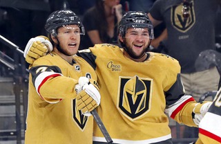 Vegas Golden Knights center William Karlsson, left, celebrates with Vegas Golden Knights center Paul Cotter (43) after scoring against the Colorado Avalanche during the first period of an NHL preseason game at T-Mobile Wednesday, Sept. 28, 2022.