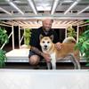 Brett Stevens, founder and CEO of Fohse, poses with his dog Jax, a 7-year-old Akita, in the Fohse showroom Wednesday, Sept. 14, 2022. The Las Vegas company makes indoor grow lights that are tuned for growing cannabis. 