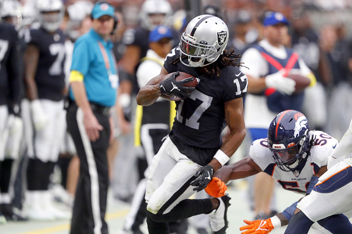 Josh Jacobs going in reverse in the Las Vegas Raiders' 38-10 loss to the  Buffalo Bills, Football