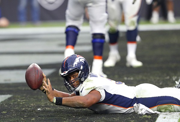 Wilson's concussion latest setback in Broncos' awful year