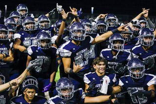 Shadow Ridge players celebrate and pose for a photo after defeating Coronado, 28-21, during a game at Shadow Ridge High School Friday, Oct. 7, 2022.