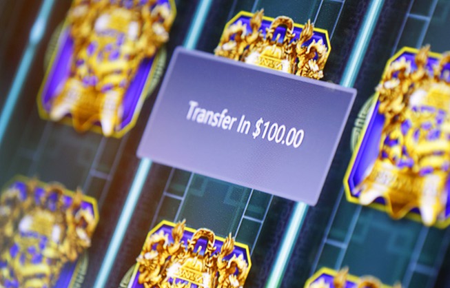 Cashless Gaming by IGT - A slot machine displays a transfer of $100