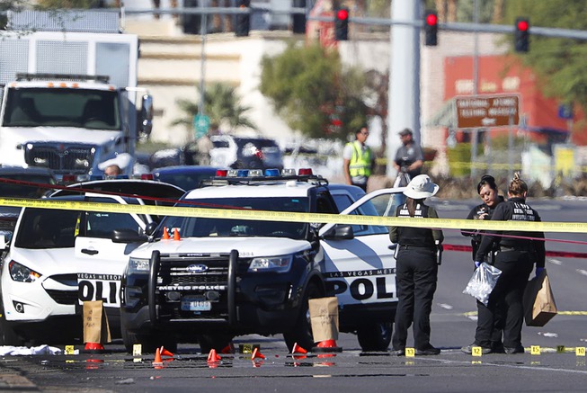 Prosecutor: Man held in Vegas officer killing fired 18 shots - Las ...