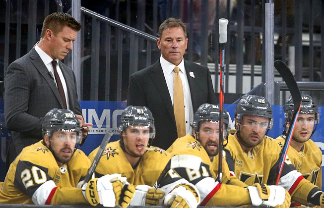 Vegas Golden Knights head coach Bruce Cassidy, center, watches as the Golden Knights play the Chicago Blackhawks in an NHL hockey game at T-Mobile Arena Thursday, Oct. 13, 2022.