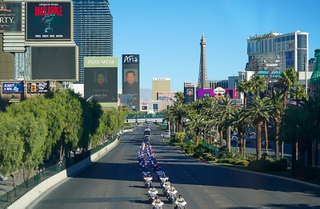 A procession for fallen Las Vegas Metropolitan Police Department Officer Truong Thai heads southbound on the Las Vegas Strip Friday, Oct. 28, 2022. In 23 years as a Las Vegas police officer, Thai served as a patrol and training officer, financial crimes investigator and firearms instructor.