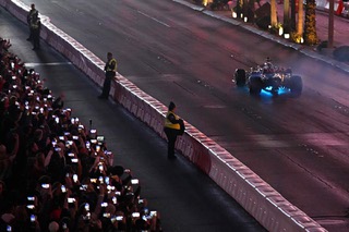 Lewis Hamilton drives during a demonstration along the Las Vegas Strip at a launch party for the Formula One Las Vegas Grand Prix, Saturday, Nov. 5, 2022, in Las Vegas.