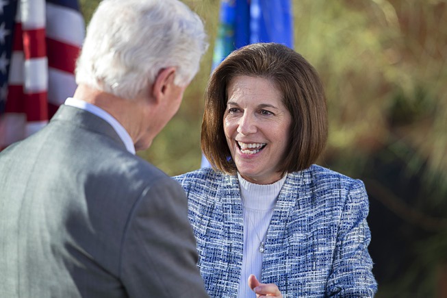 Sen. Catherine Cortez Masto, right, D-Nev., welcomes former President Bill Clinton during a campaign stop at the Nevada State AFL-CIO offices in Henderson, Nev. Sunday, Nov. 6, 2022.