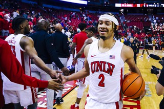 UNLV Rebels guard Justin Webster (2) congratulates his team after they win a game against the Southern University Jaguars, 66-56, at the Thomas & Mack Center Friday, Nov. 4, 2022.