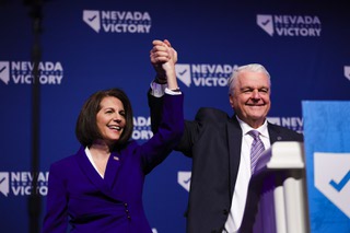 Senator Catherine Cortez Masto (D-NV) and Nevada Governor Steve Sisolak stand together on stage during the Democrats election day party on midterm Election Day Tuesday, Nov. 8, 2022.