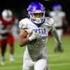 Bishop Gorman running back Micah Kaapana (22) runs for a touchdown against Liberty during the Class 5A Southern Region final at Liberty High School in Henderson, Friday, Nov. 11, 2022.