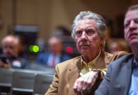 Robert Bigelow, owner of Budget Suites of America and Bigelow Aerospace, listens to Nevada Governor-elect Joe Lombardo during an event with supporters at Rancho High School Monday, Nov. 14, 2022.  Lombardo beat incumbent Democratic Governor Steve Sisolak.