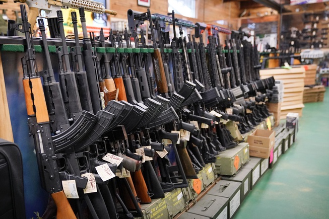 Semi-automatic rifles are displayed at Coastal Trading and Pawn, Monday, July 18, 2022, in Auburn, Maine. President Joe Biden and the Democrats have become increasingly emboldened in pushing for stronger gun control. The Democratic-led House passed legislation in July to revive a 1990s-era ban on certain semi-automatic guns, with Biden’s vocal support. And the president pushed the weapons ban nearly everywhere that he campaigned this year. 


