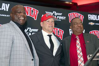 Barry Odom, center, new UNLV head football coach, poses with UNLV Athletic Director Erik Harper, left, and UNLV President Keith Whitfield during a news conference at UNLV Wednesday, Dec. 7, 2022. Odom, 46, served as the defensive coordinator at Arkansas for the past three years and was the head coach at Missouri from 2016-19.