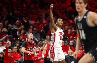 UNLV Rebels guard Luis Rodriguez (15) celebrates after sinking a three-point basket during the second half of an NCAA basketball game against the Hawaii Warriors at The Dollar Loan Center in Henderson Wednesday, Dec. 7, 2022.