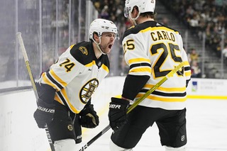 Boston Bruins left wing Jake DeBrusk (74) celebrates after scoring against the Vegas Golden Knights during the third period of an NHL hockey game Sunday, Dec. 11, 2022, in Las Vegas.