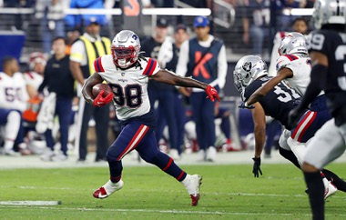 New England Patriots running back Rhamondre Stevenson (38) carries the ball on the final play against the Las Vegas Raiders during the second half of an NFL football game at Allegiant Stadium Sunday, Dec. 17, 2022.