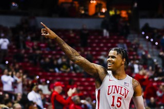 UNLV Rebels guard Luis Rodriguez (15) gestures towards fans after his team defeats the Southern Miss Golden Eagles, 74-63, during a game at the Thomas & Mack Center Thursday, Dec. 22, 2022.