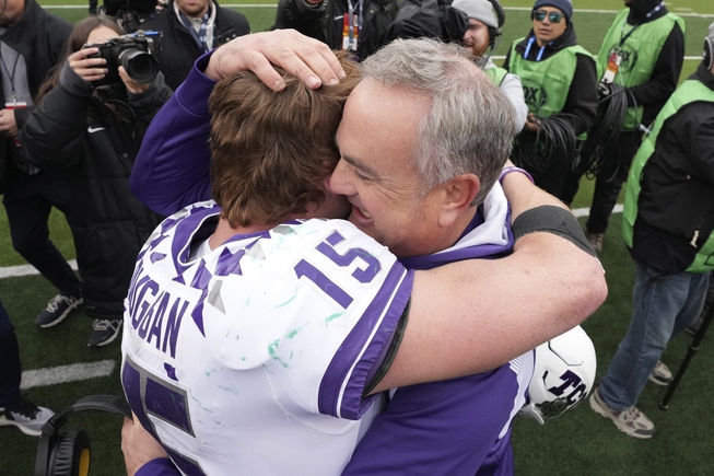 TCU head coach Sonny Dykes, right, hugs quarterback Max Duggan (15) after a game against Baylor in Waco, Texas, on Nov. 19, 2022. Duggan has thrown for 3,321 yards with 30 touchdowns and only four interceptions, and run for 404 yards with six more scores, heading into the Fiesta Bowl on Dec. 31. 


