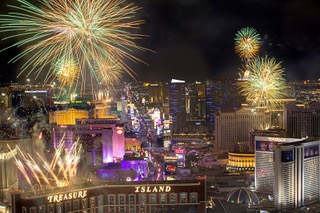 Fireworks explode over Las Vegas Strip casinos just after midnight on Jan 1, 2023, viewed from the Trump International Hotel.
