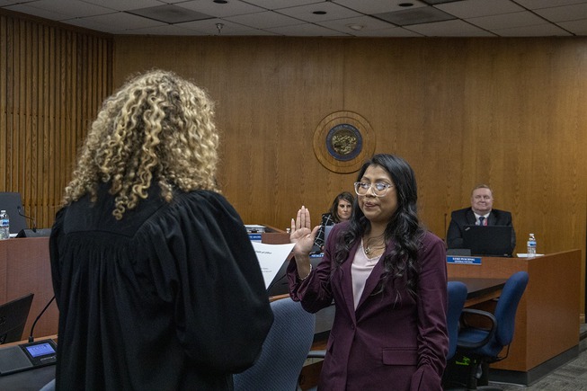 Brenda Zamora is sworn into office as the District D School Board representative. Both she and Bustamante Adams will be attending their first regular session board meeting today.