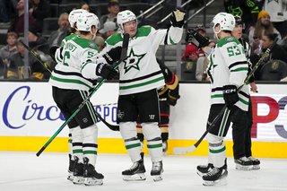 Dallas Stars defenseman Ryan Suter, second from right, celebrates after scoring against the Vegas Golden Knights during the third period of an NHL hockey game Monday, Jan. 16, 2023, in Las Vegas. (AP Photo/John Locher)