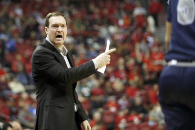 UNLV Rebels head coach Kevin Kruger calls out from the sidelines during the first half of an NCAA basketball game against the Nevada Wolf Pack Saturday, Jan. 28, 2023, in Las Vegas.