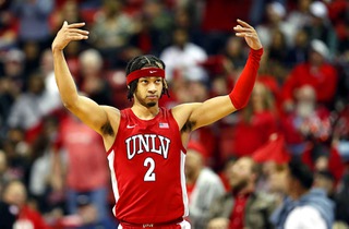 UNLV Rebels guard Justin Webster (2) works the crowd during the second half of an NCAA basketball game against the Nevada Wolf Pack  Saturday, Jan. 28, 2023, in Las Vegas.