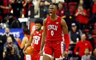 UNLV Rebels forward Victor Iwuakor (0) celebrates as the Rebels pull ahead of the Nevada Wolf Pack during the second half of an NCAA basketball game Saturday, Jan. 28, 2023, in Las Vegas.