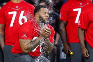 A water balloon ruptures in the hands of Tennessee Titans interior lineman Jeffery Simmons in the Splash Catch Competition during the 2023 Pro Bowl Games at the Las Vegas Raiders Headquarter/Intermountain Healthcare Performance Center in Henderson Thursday, Feb. 2, 2023.