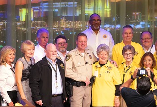 Sheriff Kevin McMahill poses for a photo with chaplains and civilian volunteers after delivering the State of the Department address at the Smith Center Wednesday, Feb. 8, 2023.