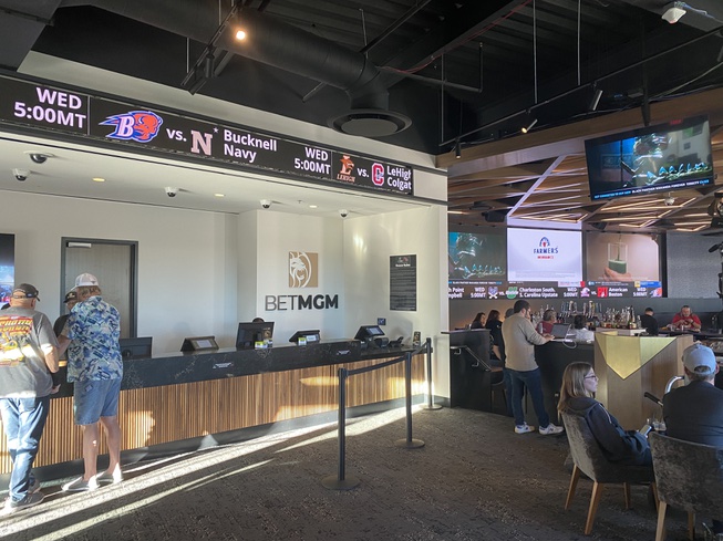 Fans lounge and watch games on Tuesday Feb. 16, 2023, at the BetMGM sports book at State Farm Stadium.