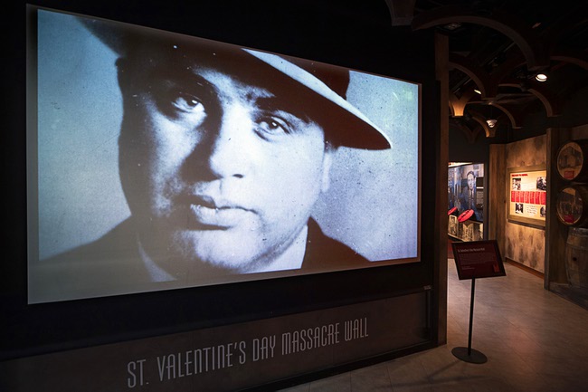 A photo of gangster Al Capone is projected over over a section of the St. Valentine's Day Massacre wall at the Mob Museum in downtown Las Vegas Friday, Feb. 10, 2023.