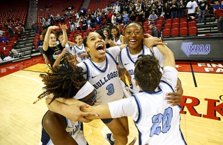 Centennial High School players celebrate their 59-20 victory over Coronado in the NIAA girls 5A state championship at the Thomas & Mack Center Saturday, Feb. 25, 2023.