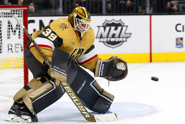 Vegas Golden Knights goaltender Laurent Brossoit (39) makes a save during the second period of an NHL hockey game against the Dallas Stars at T-Mobile Arena Saturday, Feb. 25, 2023.