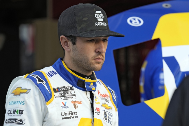 Chase Elliott watches as his crew works on his car during a practice for the NASCAR Daytona 500 auto race Friday, Feb. 17, 2023, at Daytona International Speedway in Daytona Beach, Fla. 


