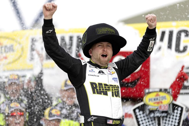 William Byron celebrates in Victory Lane after winning a NASCAR Cup Series auto race on Sunday, March 5, 2023, in Las Vegas. 