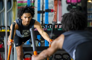 Alijah Adem, a Spring Valley High School basketball point guard, works out at J&D Fitness Thursday, March 9, 2023. Adem is recovering after an ACL injury.