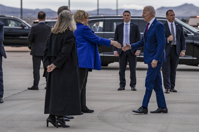 President Joe Biden arrives in Las Vegas, Nevada, and is greeted by Mayor Carolyn Goodman of Las Vegas, Rep. Dina Titus (D-Nev.) and Clark County Commission Chairman Jim Gibson, where the president will participate in a Democratic National Committee fundraising on Tuesday, March 14, 2023. 
