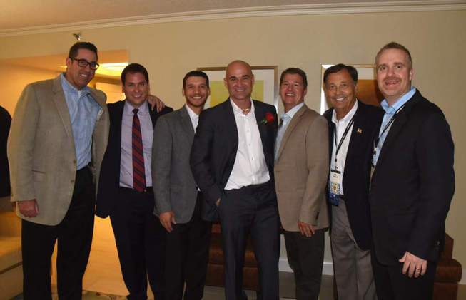 A contingent of Las Vegas advocates pose for a photograph at the 2015 National Association of Collegiate Directors of Athletics Convention in Orlando, Fla. From left, Dan Rush (MGM Resorts), current Secretary of State Francisco Aguilar, Vincente Rivera (MGM Resorts), Tennis Hall of Famer Andre Agassi, Dale Eeles (Las Vegas Events), Jim Livengood (former UNLV athletic director) and D.J. Allen (former UNLV associate athletic director).