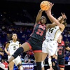 Michigan forward Cameron Williams (44) battles UNLV center Desi-Rae Young (23) for a rebound in the second half of a first-round college basketball game in the women's NCAA Tournament in Baton Rouge, La., Friday, March 17, 2023,