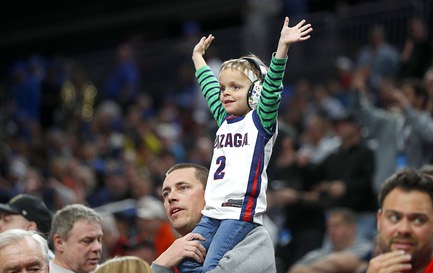 A Gonzaga Bulldogs fan cheers during the second half of a Sweet Sixteen NCAA Tournament basketball game between the Gonzaga Bulldogs and the UCLA Bruins at T-Mobile Arena Thursday, March 23, 2023.