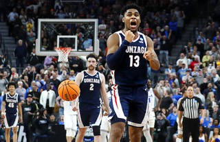 Gonzaga Bulldogs guard Malachi Smith (13) celebrates as time runs out for UCLA Bruins during the second half of a Sweet Sixteen NCAA Tournament basketball game at T-Mobile Arena Thursday, March 23, 2023. Gonzaga beat UCLA 79-76.